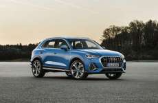 Audi-Q3-2-Generation-Exterieur-Seitenperspektive-Blau-